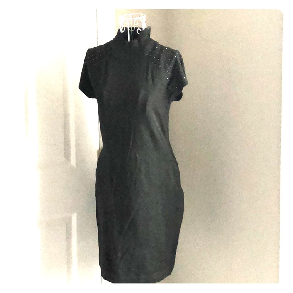 Sweater dress with stud detail.